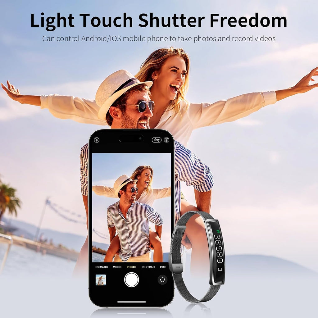 Smartphone with camera app open showing a photo of a couple, with a Actyraxer Tracker Bracelet on a beach background.