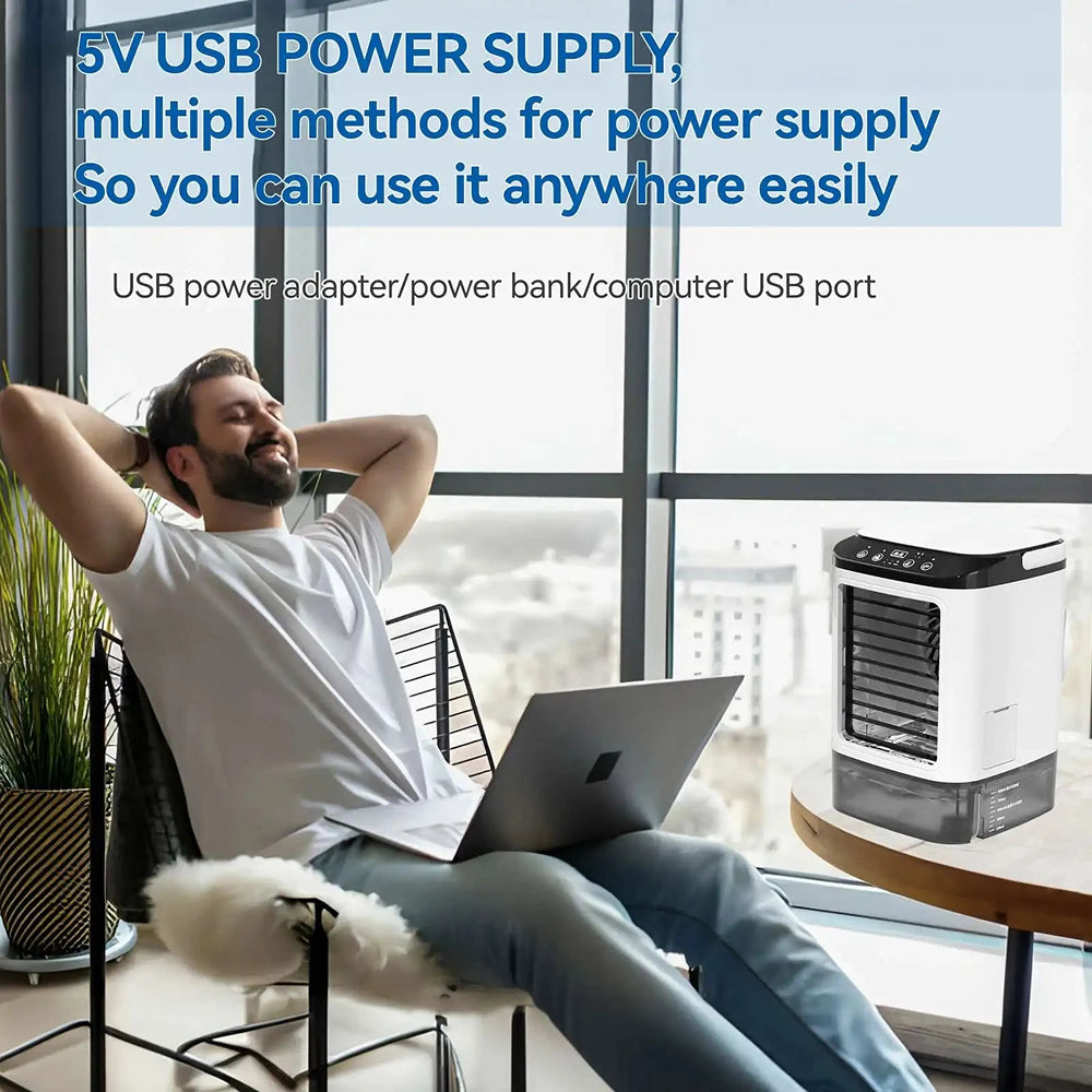 Person using a laptop with a GlaciVyex Portable Air Conditioner in a modern room.