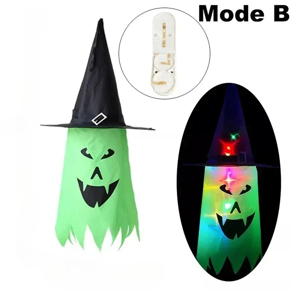 HexWitchi Jack O Lantern with glowing face and witch hat on a white background