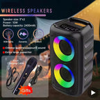 Black KaraTunex Portable Karaoke Machine with RGB lights, microphone, and charging cable on a dark background