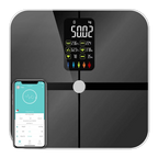 A KiloGridi Smart Scale with a glossy black glass surface, featuring a central display screen showing weight and health metrics, alongside a smartphone showing a companion app on a white background.