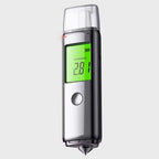A Pufresher Breathalyzer with a metallic silver body, a clear top cap, and a bright green digital display screen showing a reading of 2.81.