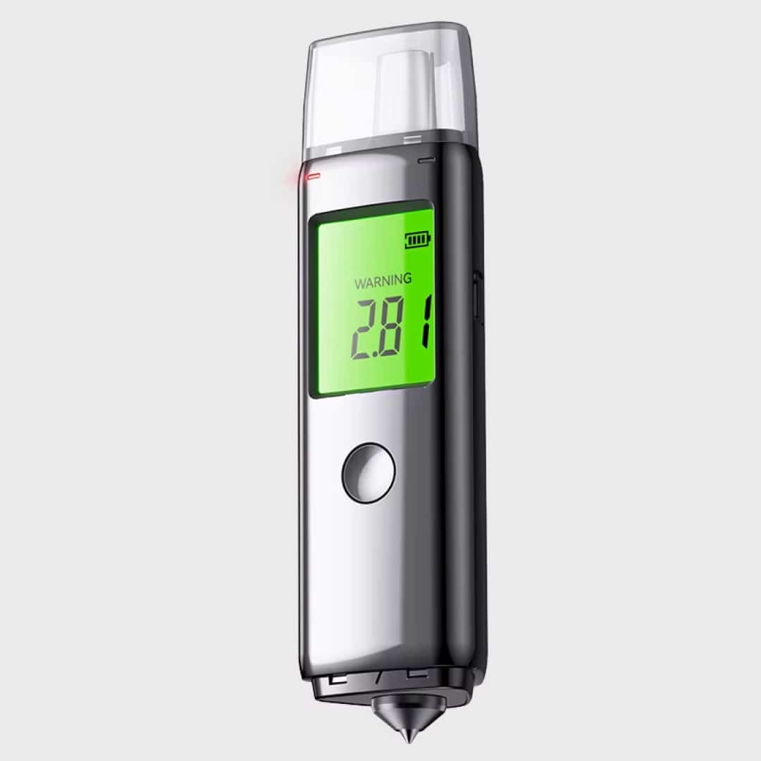 A Pufresher Breathalyzer with a metallic silver body, a clear top cap, and a bright green digital display screen showing a reading of 2.81.