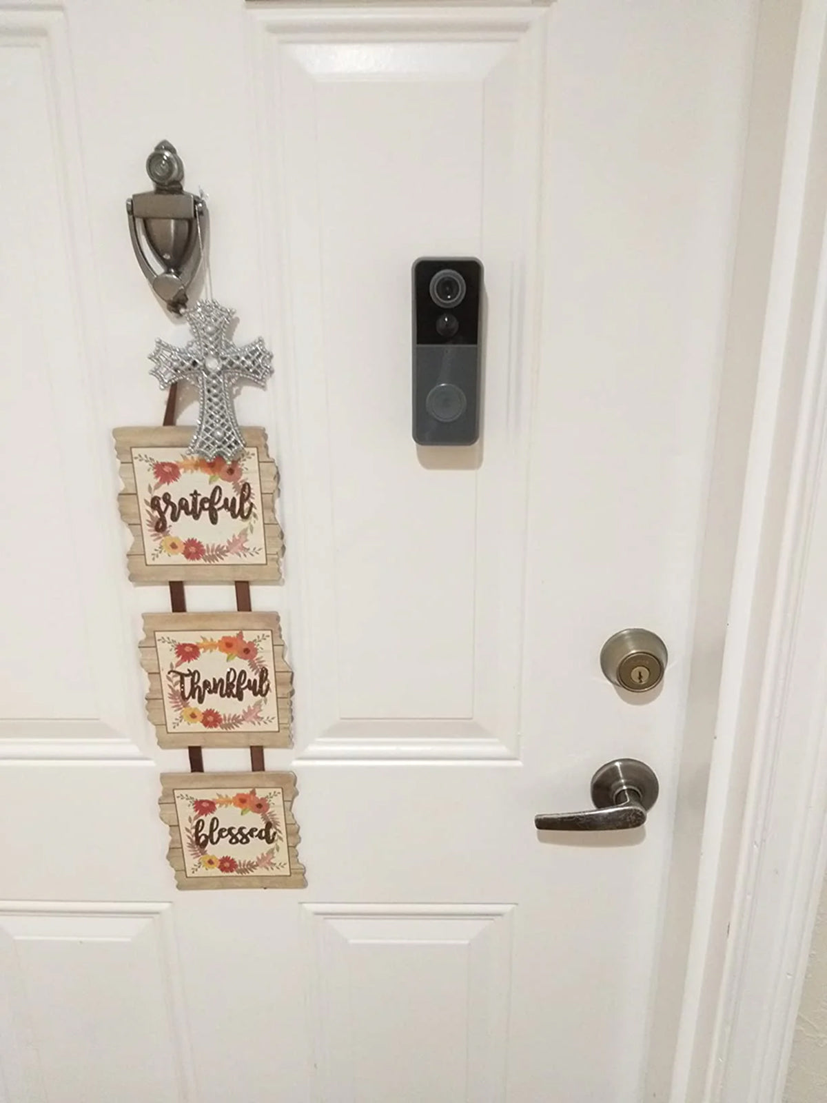 Decorative sign with 'Grateful', 'Thankful', and 'Blessed' on a door with a  PurePeeki Camera Doorbell 