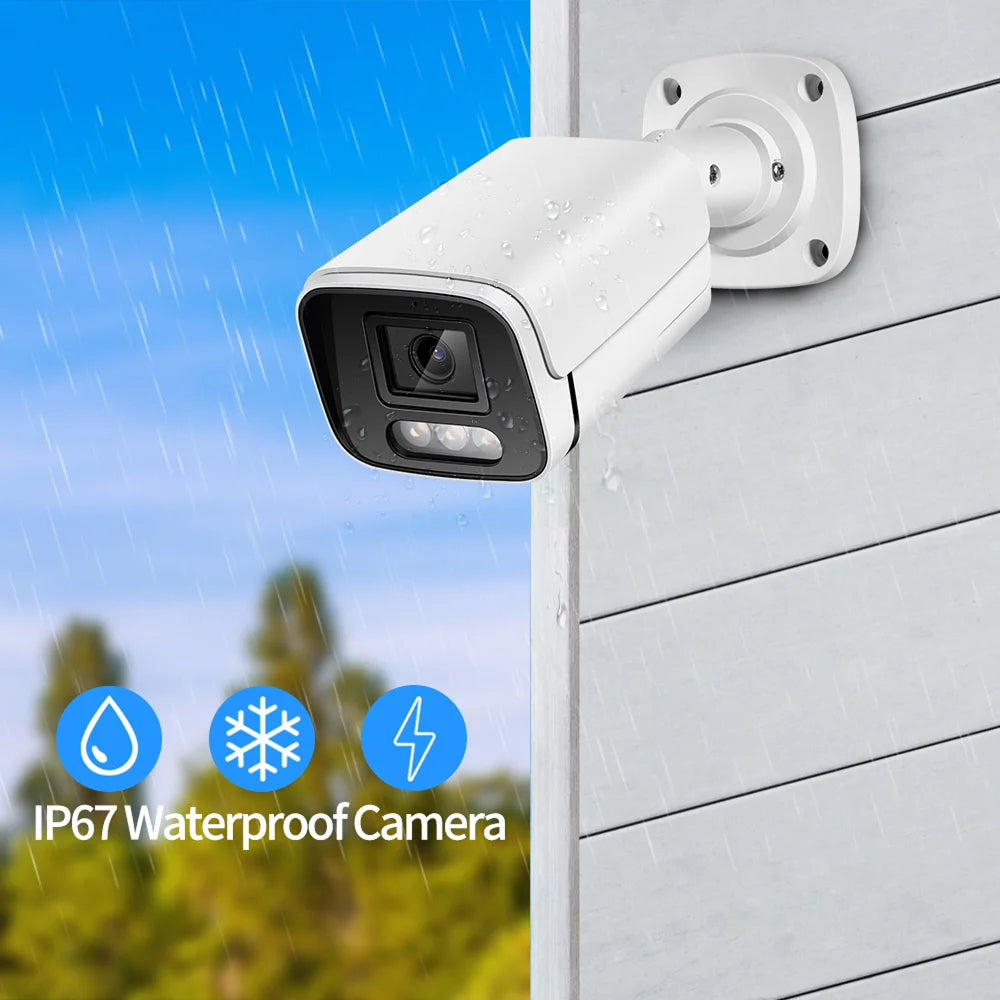SpotKamyl Spotlight Camera  mounted on a wall with outdoor scenery in the background showing its waterproof