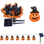 Sunpikoex Solar Pumpkin Lights with orange jack-o'-lantern bulbs wearing black witch hats, shown with a small solar panel, stake, and a single bulb displayed separately on a white background.