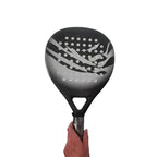 Black and gray Tennisixo Padel Racket held by a hand on a white background