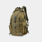  The Trekorago Hunting Backpack with multiple straps, buckles, and webbing on a light gray background.