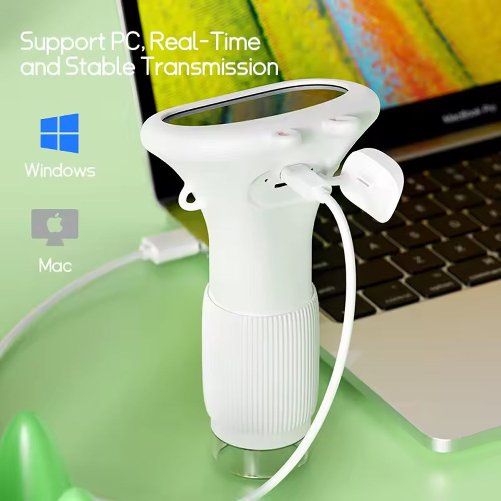 White ZoomiWiz HD Kids Microscope on a green surface with a laptop in the background, featuring Windows and Mac logos.