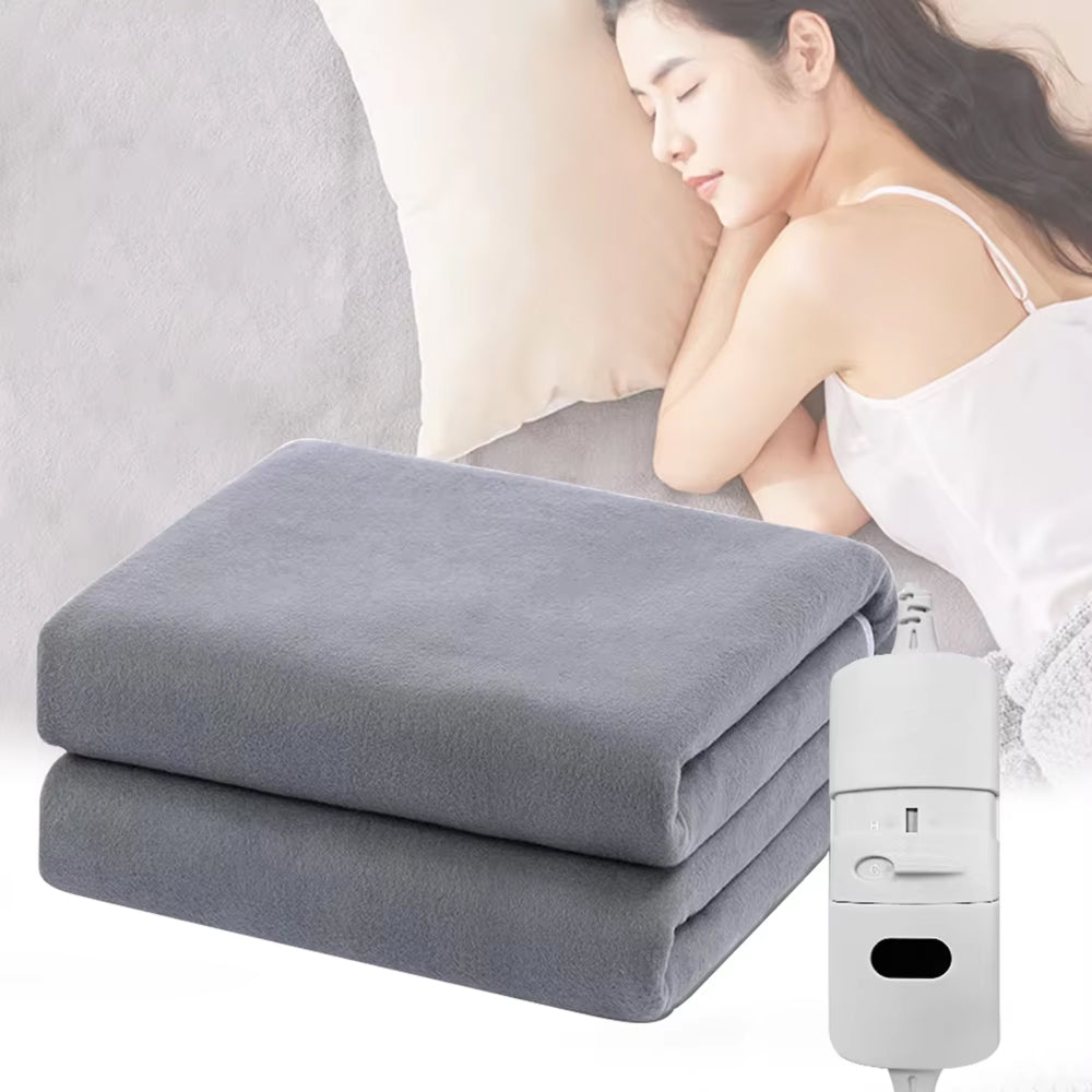 CoziraCe Heated Blanket on a bed