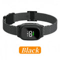 Black electronic dog collar with digital display on a white background